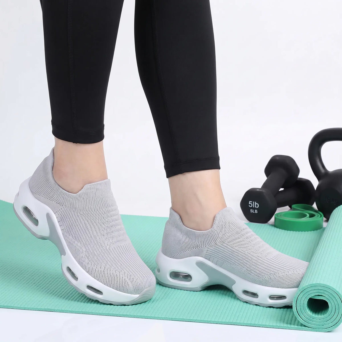 HexoComfy™ Men's Orthopedic Hands-Free Shoes in Light Gray worn on a yoga mat