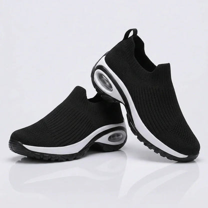 HexoComfy™ Men's Orthopedic Slip-On Shoes in Black, pair on a plain background