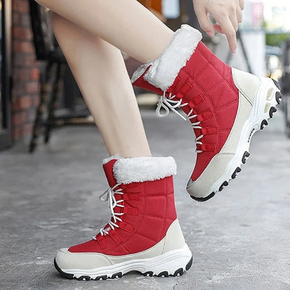 Woman wearing HexoComfy™ Women's Orthopedic Winter Boots in Red on a city pavement